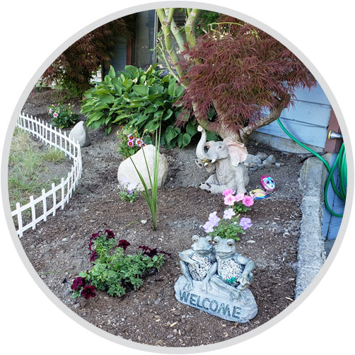 Garden Bed Planting and Statues